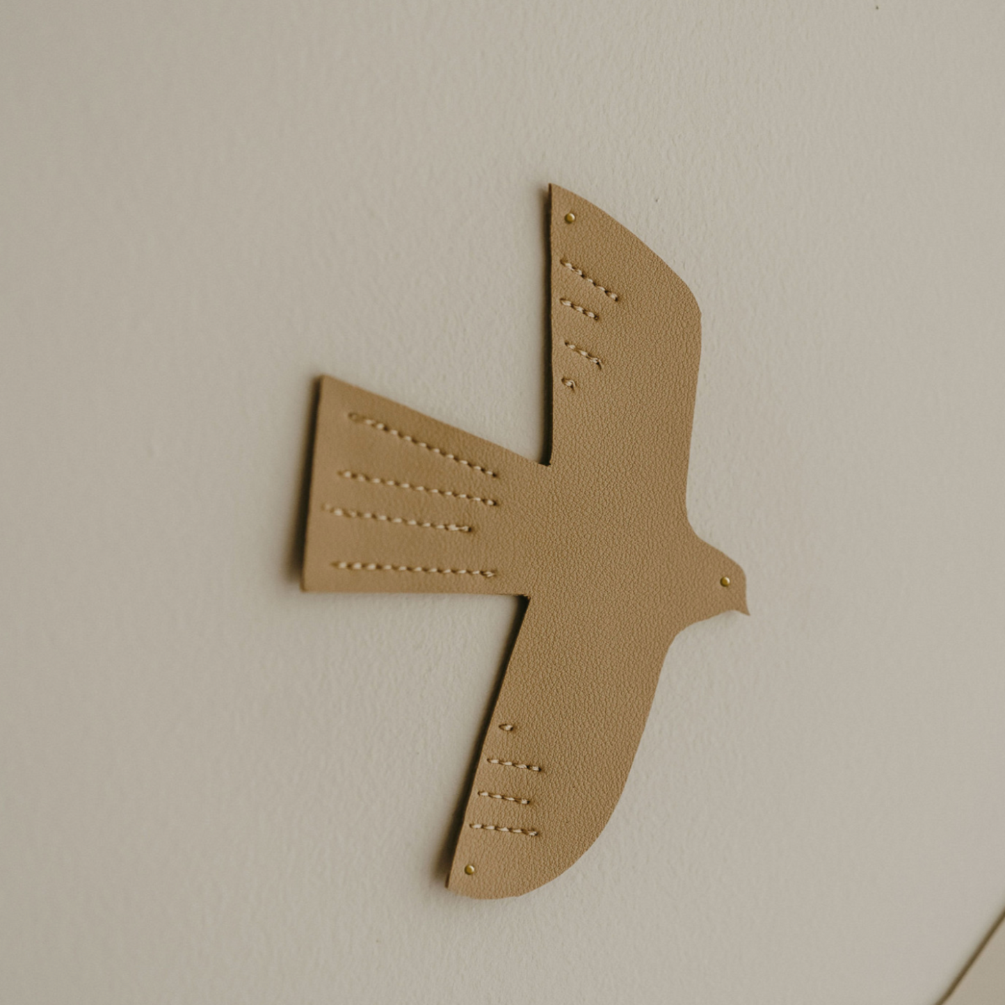 Oiseau en cuir