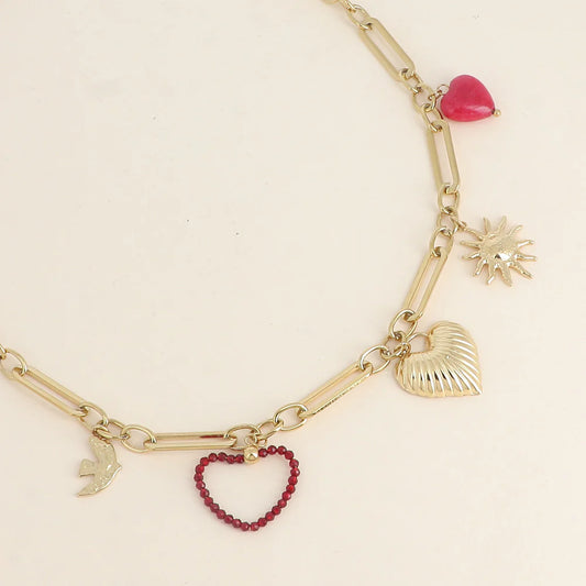 Collier - breloques rouges (soleil, oiseau...)